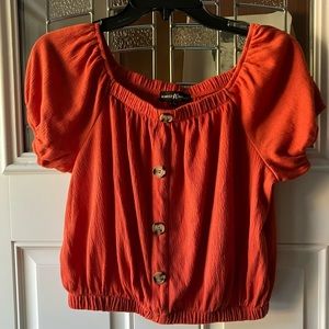 Gently used- Junior large tangerine colored short sleeve crop top